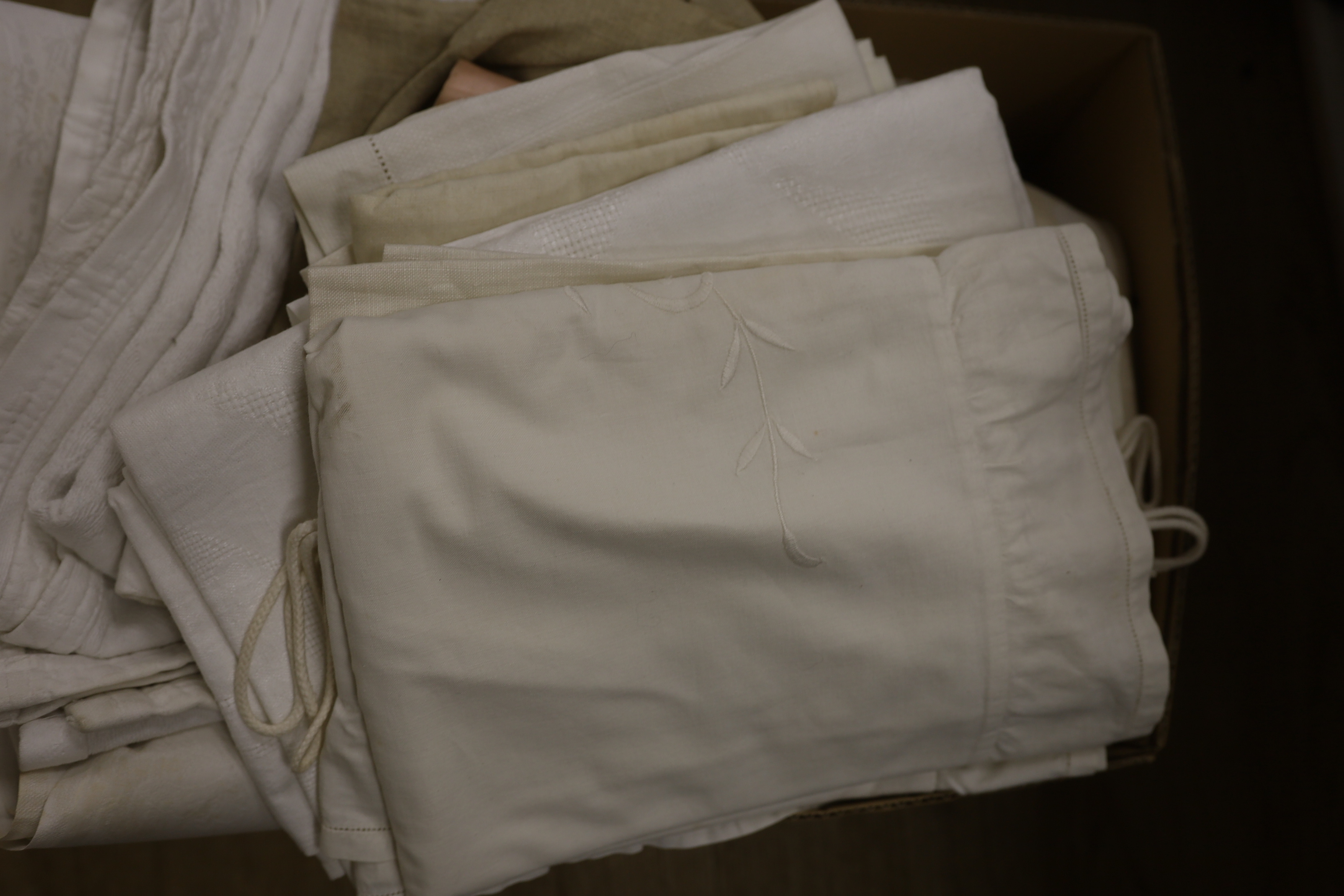 A damask linen table cloth with swan design, various table linens, watered silk embroidered bag, etc